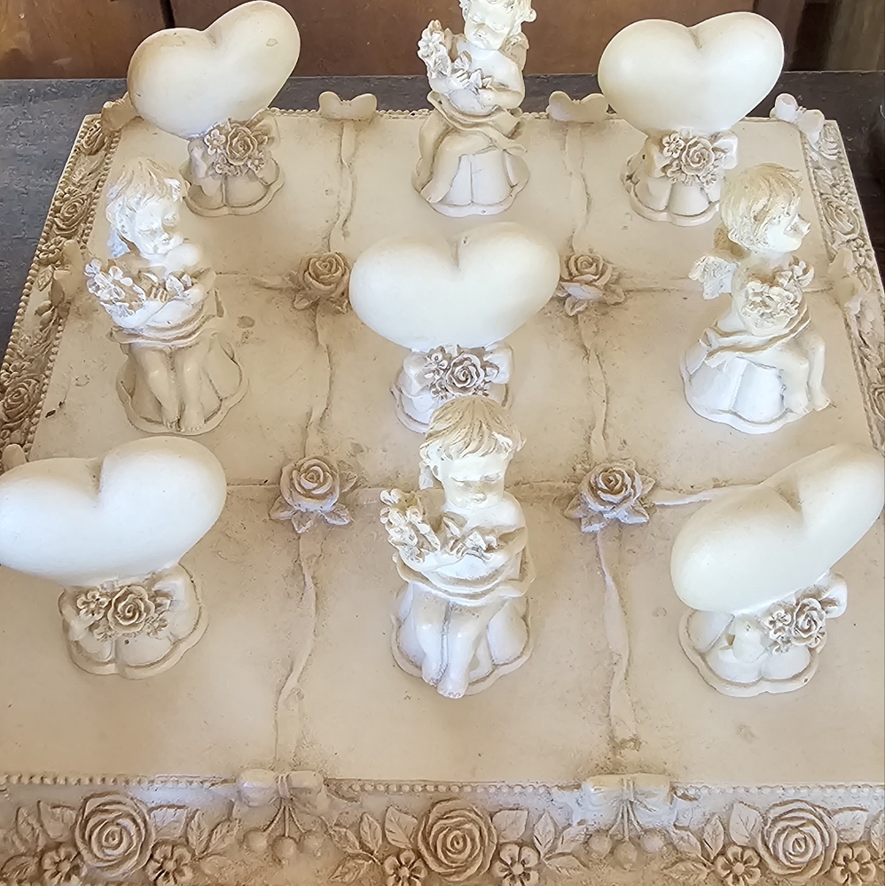Vintage AVON ceramic cherub tic-tac-toe game.